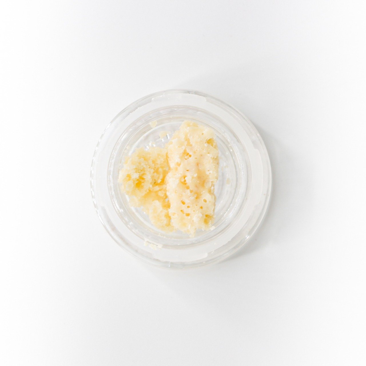 7gK4fZTRe6mousitYR2A_whitetahoecookies_crumble.jpg White Fire Crumble Nahaufnahme der goldgelben Textur